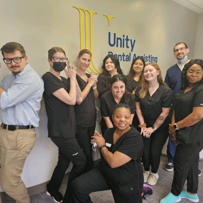 Photo of Unity Dental Assisting students during class at our Dental Assistant School.