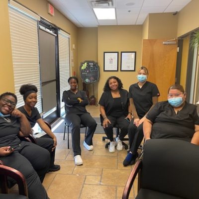 Photo of Unity Dental Assisting students during class at our Dental Assistant School.
