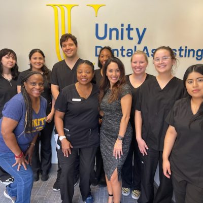Photo of Unity Dental Assisting students during class at our Dental Assistant School.