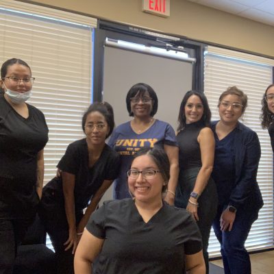 Photo of Unity Dental Assisting students during class at our Dental Assistant School.